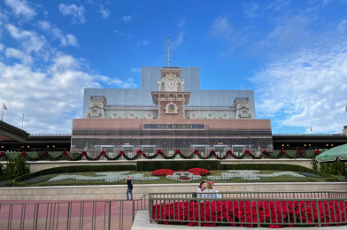 PHOTOS: Main Street, U.S.A. Train Station Scrim Now Completely Themed at Magic Kingdom