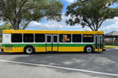 PHOTOS: New Pluto Character Bus Wrap Arrives at Walt Disney World