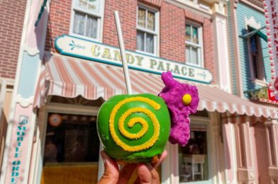 REVIEW: Main Street Electrical Parade Snail-Inspired Candy Apple is a Delightful Treat at Disneyland