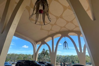 PHOTOS: Gran Destino Tower at Disney’s Coronado Springs Resort Turns Red & Green With Christmas Decorations